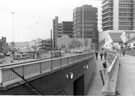 View: s23075 Arundel Gate from the pedestrian subway across to Howard Street looking towards Family and Community Services Department, Redvers House; The Tower office building and Furnival House showing the underpass at Furnival Gate roundabout