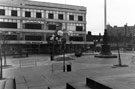 View: s23123 Paved area around Barkers Pool War Memorial with Cole Brothers in the background