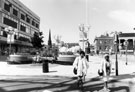 View: s23126 Paved area around Barkers Pool War Memorial and Cole Brothers looking towards Division Street 