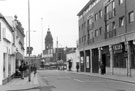 View: s23147 Yates Wine Lodges Ltd., Division Street looking towards Barkers Pool War Memorial with the Odeon Cinema and Town Hall in the background