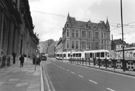 View: s23856 Supertram No. 4 at the Cathedral Supertram stop, Church Street with the Gladstone Buildings in the background