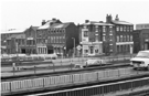 View: s23886 View over the underpass, Arundel Gate looking towards No. 153, Norfolk Valet Services; Central Appliance Services and Charles Street showing premises including ; Eyre Plating and Cutlery Ltd. and Saville Press Ltd., printers 