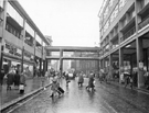 View: s23901 William Timpson Ltd., shoe and shoe repair shop (left); Castle Market Gallery and Castle Market (right), Exchange Street looking towards Castle Street