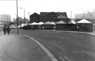 View: s23912 Street Market Stalls, Exchange Street looking towards the Merchants Crescent Coal Offices and Terminal Waharehouse, Canal Basin with Hyde Park Flats right