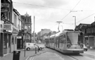 View: s23999 Supertram No. 09 travelling along Glossop Road to Herdings Park with the junction of Regent Terrace left