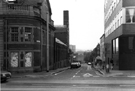 View: s24428 Victoria Street looking towards Nos. 66 - 68 The Bath Hotel from Glossop Road with the former Glossop Road Baths left