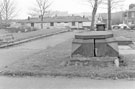 View: s24474 Base of the memorial to Robert Ernest MD (1771-1841), St. Philip's Churchyard, Infirmary Road looking towards Ashton Alarms; Sunseeker, Penistone Road and The Wellington public house (later became the Cask and Cutler), No. 1 Henry Street