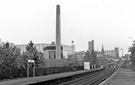 View: s25789 Attercliffe Road Station looking towards Bernard Road Incinerator with Hyde Park Flats and St. John's Church Park in the background 