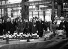 View: s28357 Queen Elizabeth II and HRH Duke of Edinburgh accompanied by Lord Mayor J.H. Bingham viewing finished products at the English Steel Corporation, River Don Works, Brightside Lane during the royal visit   