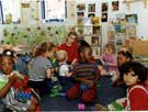 View: s28559 Children playing at the African Caribbean Enterprise Centre Nursery, African Caribbean Business Centre, Wicker