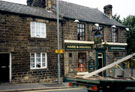 Nos. 6 - 8, Church Street, Oughtibridge. No. 6, Hare and Hounds public house, right