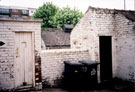 Yard at rear of Nos. 157 - 167 West Street, outhouses face the rear wall of the buildings on West Street, new buildings are on Fitzwilliam Street