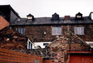 Rear of Nos. 157 - 165 West Street, from Westhill Lane, brick structures in the foreground are the outhouses in the yard