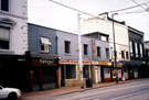 Nos. 157 - 167 West Street, premises include No. 157, No. 159, Darlows Sports (process of refurbishment), Henger, barbers shop, No. 167, Khan's, Indian Restaurant