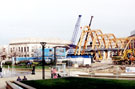 Construction of the Winter Garden from Peace Gardens. Central Library in background