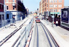 View: t01319 West Street during the construction of Supertram. Inland Revenue Offices in background