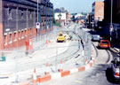 View: t01321 Glossop Road during the construction of Supertram. Somme Barracks, left