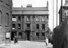 Broadbent House, also known as 'The Old Banker's House', No. 3 Hartshead, Figtree Lane, right, St. Peter's Close under arch