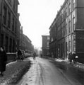 View: t01703 Bank Street at junction with Scargill Croft. Flint and Co., solicitors, with lamp. Sheffield County Court and Queen Street Chambers in background