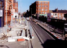 View: t02014 West Street during the construction of Supertram. Inland Revenue Offices on right. Hallamshire Hotel, left