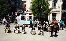 Kutamba Kids lead by Mandla Sibanda at the top of Fargate taking part in Chance to Dance