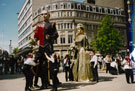 Catalan Giants taking part in Chance to Dance in Fargate with Yorkshire House and Barkers Pool in the background