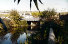 Five Weirs Walk looking towards Brightside Bridge and Bridge Inn with housing on Wincobank Hill in the background