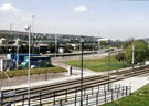 View: t02728 View from footbridge over Railway linking Canal towpath and Tinsley/ Meadowhall South Supertram stop looking towards Meadowhall Way