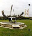 View: t02739 Harry Brearley sundial, created by Wendy Taylor, erected to the memory of Harry Brearley inventor of stainless steel, located between Don Valley Stadium and the footbridge to Don Valley Bowl (in the background)