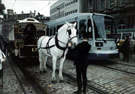 View: t02810 Old horse drawn tram No. 15 alongside Supertram No. 07 at the Cathedral Supertram stop, Church Street 