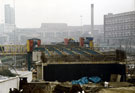 Construction of Bow String Bridge, Park Square with Park Hill Flats in the background (right)