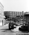 View: t03036 Pond Hill looking towards the Old Queens Head public head with the Pond Street bus station, right and Park hill Flats in the background