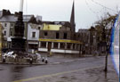 View: t03093 Demolition of the Albert public house, No. 2/4 and No. 6 Snaxgalore, Cambridge Street and the junction of Division Street showing the War Memorial, Barkers Pool with St. Matthew's Church spire in the background