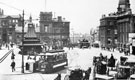 View: t03144 Sheffield in the 1900's, Fitzalan Square showing the cab stand in the foreground, Market Street (High Street), left, Fitzalan Market Hall and Omnibus Waiting Rooms, centre