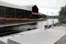 Construction of the Bailey Bridge, Five Weirs Walk across the River Don from Effingham Street across to the rear of property on Savile Street