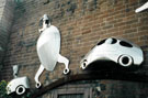 View: t03310 Car Mural Sculpture by Johnny White on the wall of Harratts Volvo Sheffield, Vulcan Foundry, Attercliffe Road