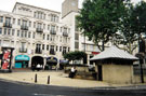 The White Building, Fitzalan Square showing Colonnade Insurance Brokers; No. 8, Tag's Sheffield Model Shop and No. 6, GT News with South Yorkshire Police facility in the foreground