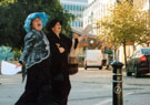 Sheffield Popular Arts - A Scene from the Suffragette Walking Tour - singing suffragette songs in Tudor Square