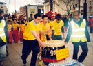 View: t03841 Lions and Drummer leave Barkers Pool during the Chinese New Year Procession 