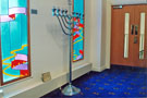 Stained glass window and the Menorah, interior of the Synagogue, Kingfield Hall, Psalter Lane