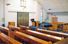 Interior of the Synagogue, Kingfield Hall, Psalter Lane showing The Ark and the stained glass windows 