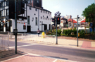 Pelican crossing on Pond Street looking towards Surrey Lane with (left) The Howard Hotel, No. 57 Howard Street