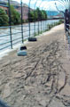 Debris left after the Flood of 25th June 2007 showing the River Don still running at a high level between Savile Street and Effingham Street