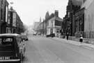 View: t05310 Cemetery Road, with the two towers of Cemetery Road Baptist Church in the centre, and the tower of Cemetery Road Congregational church just beyond them.