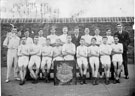 Possibly a school athletics team and an unidentified winners shield, with connections to Tom Stainrod