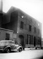 Front of Jn. Figorski Ltd., cabinet makers, No. 3 Eyre Street and passage leading to Leader House