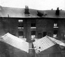 Possibly the taken from Paget Street playground looking towards the rear of Alfred Road showing damage to roof