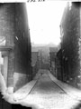 Rodgers Lane looking from No. 47 St. Thomas Street towards Abney Street showing Bala Street (formerly West John Lane) halfway up on the left . showing side view of No. 2 Rodgers Lane