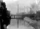 Ball Street Bridge over River Don, looking upstream, Neepsend. Brooklyn Works, (Steel), left. Ball Bridge Works (Engineers), right, foreground and Lion Works in background