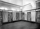 Method of covering shelves by using spring blinds, Woodhouse Branch Library, Tannery Street